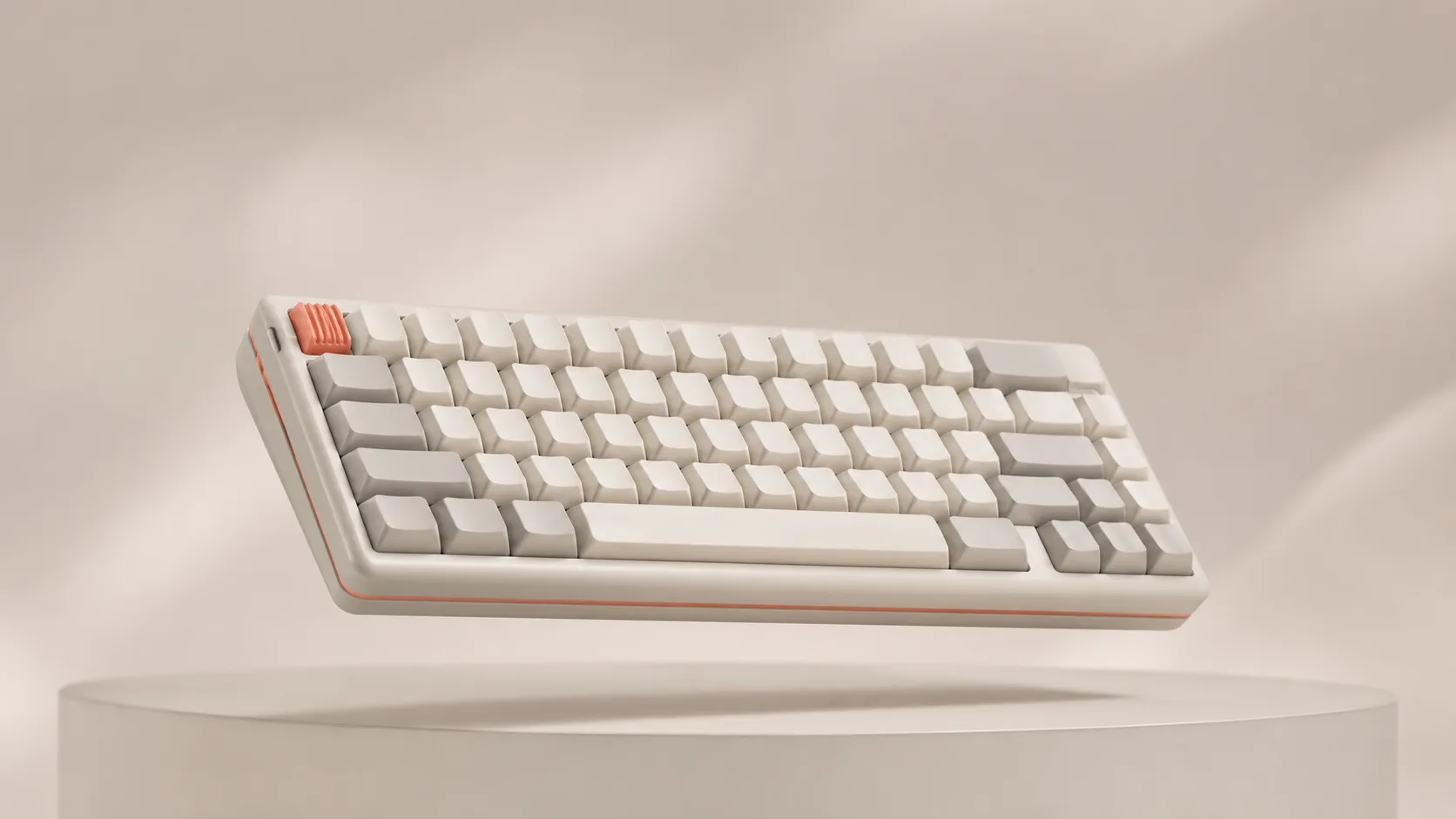 Compact mechanical keyboard with blank keycaps floating above a soft podium