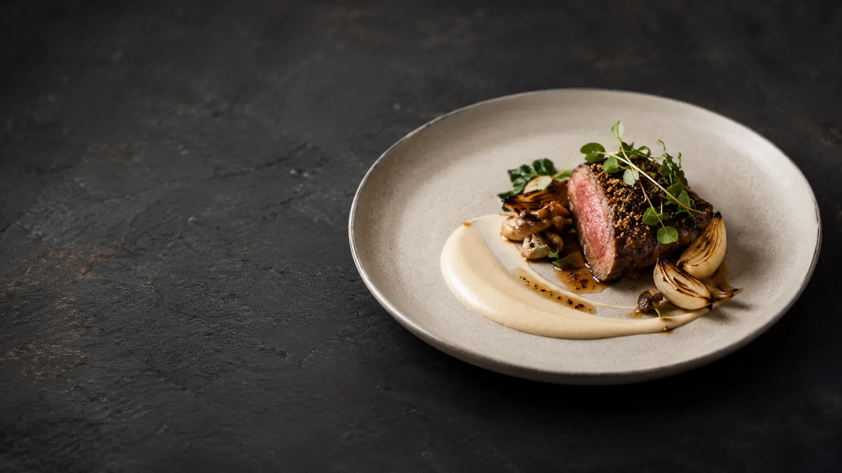 Editorial photograph of an elegant fine-dining plated dish with delicate garnishes