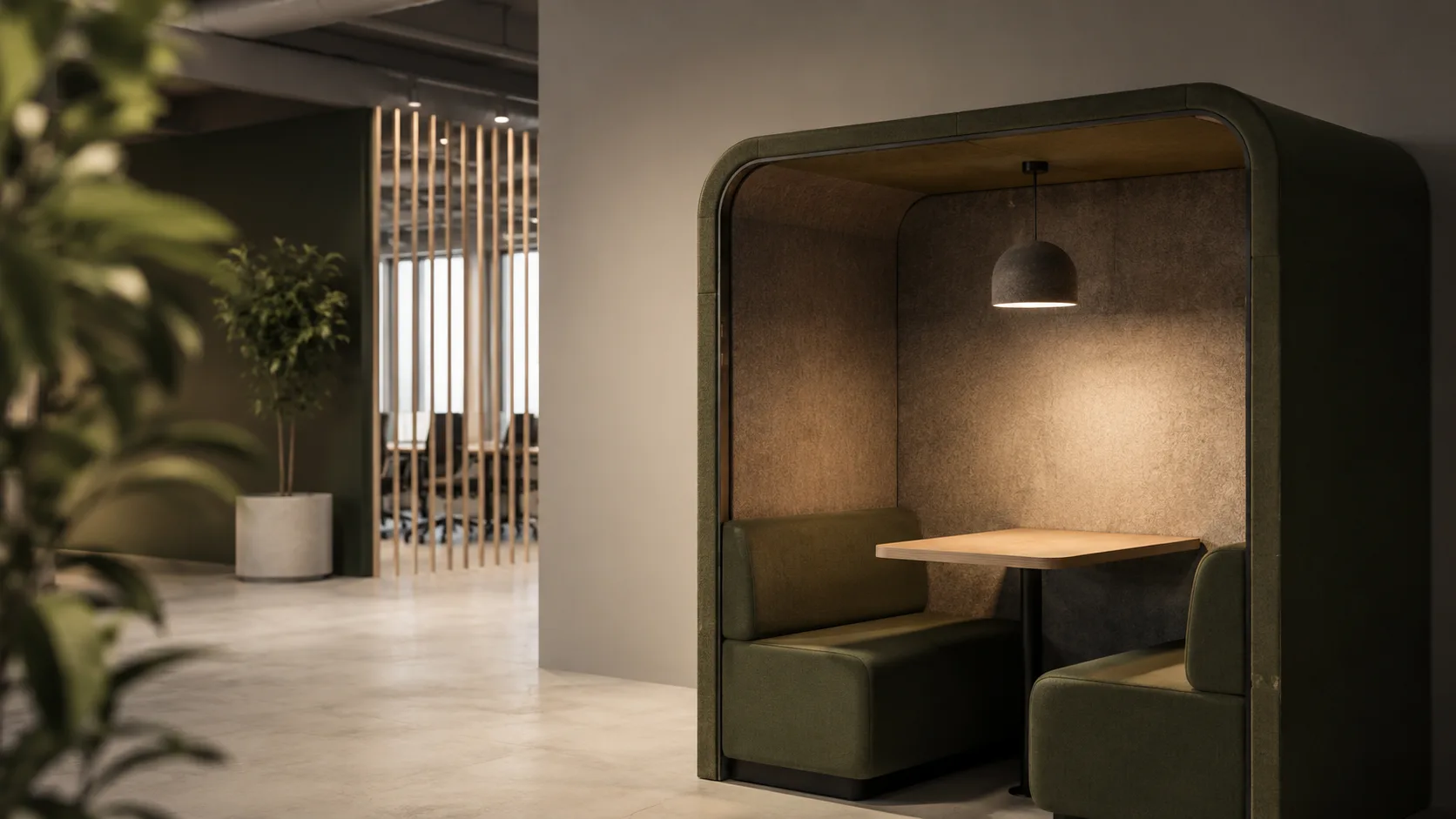 Editorial interior photograph of a private office focus pod with an upholstered booth