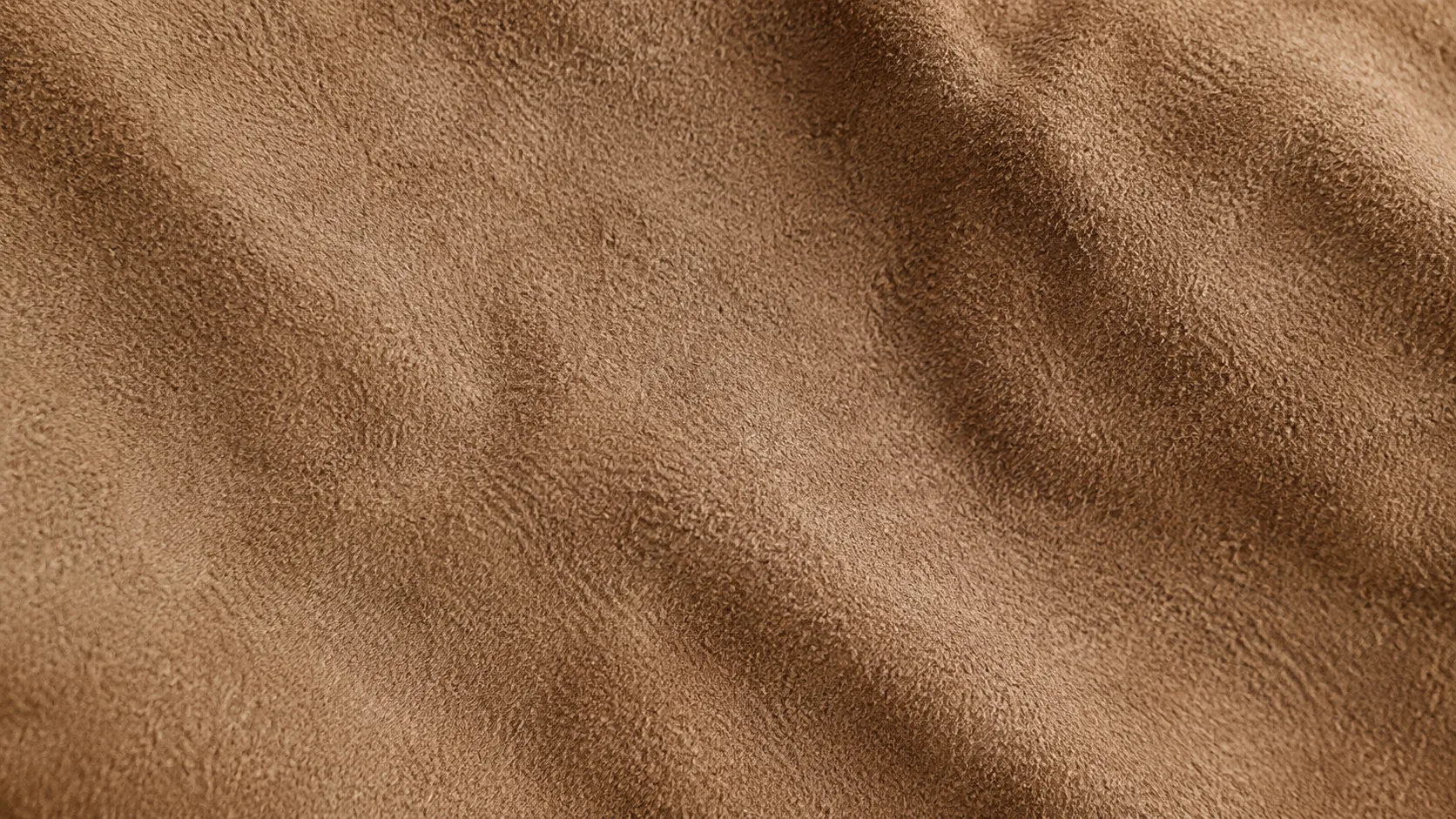 Photoreal soft suede fabric texture background with warm taupe nap