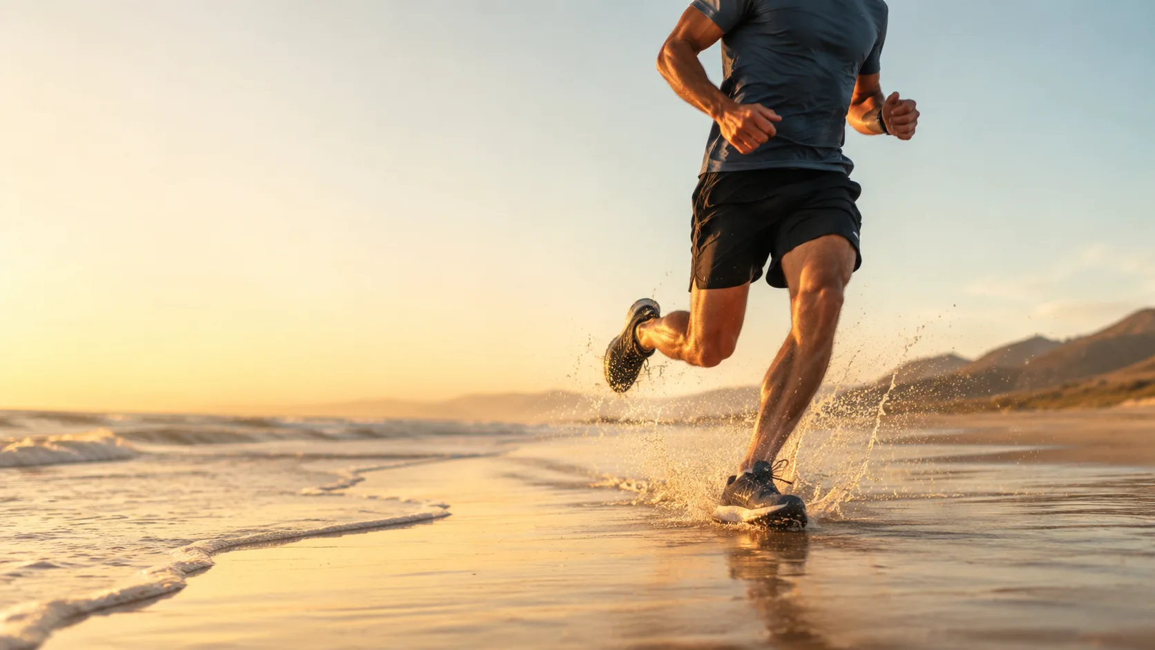 Editorial sports photograph of a runner mid-stride on a beach at sunrise