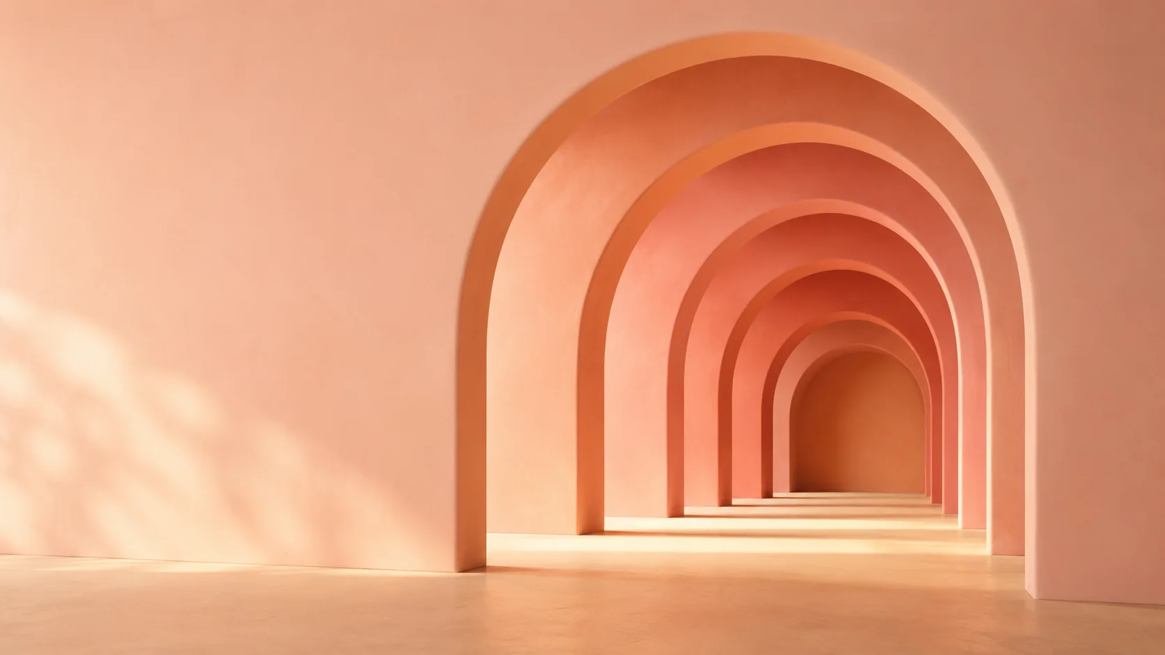 Nested rounded arches receding in depth with warm pooling light